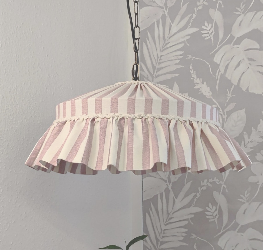 Blush striped ruffled lampshade – a charming touch for cottage bedroom ideas.