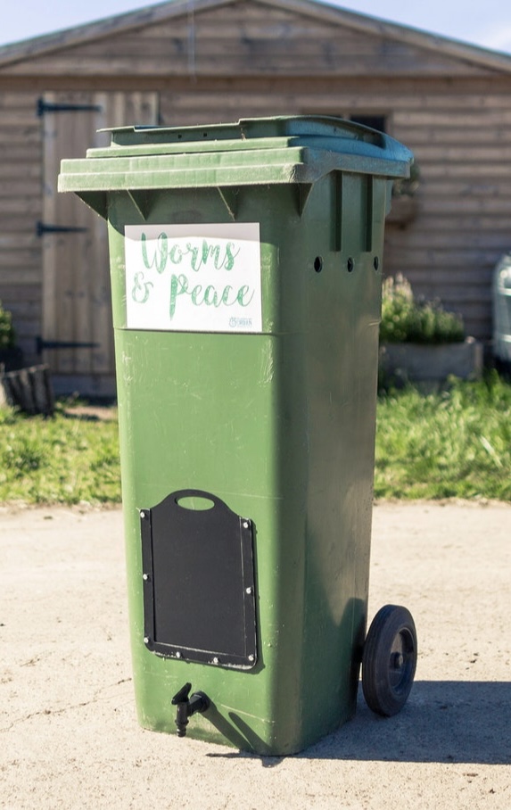 Wheelie bin worm farm DIY kit in UK garden