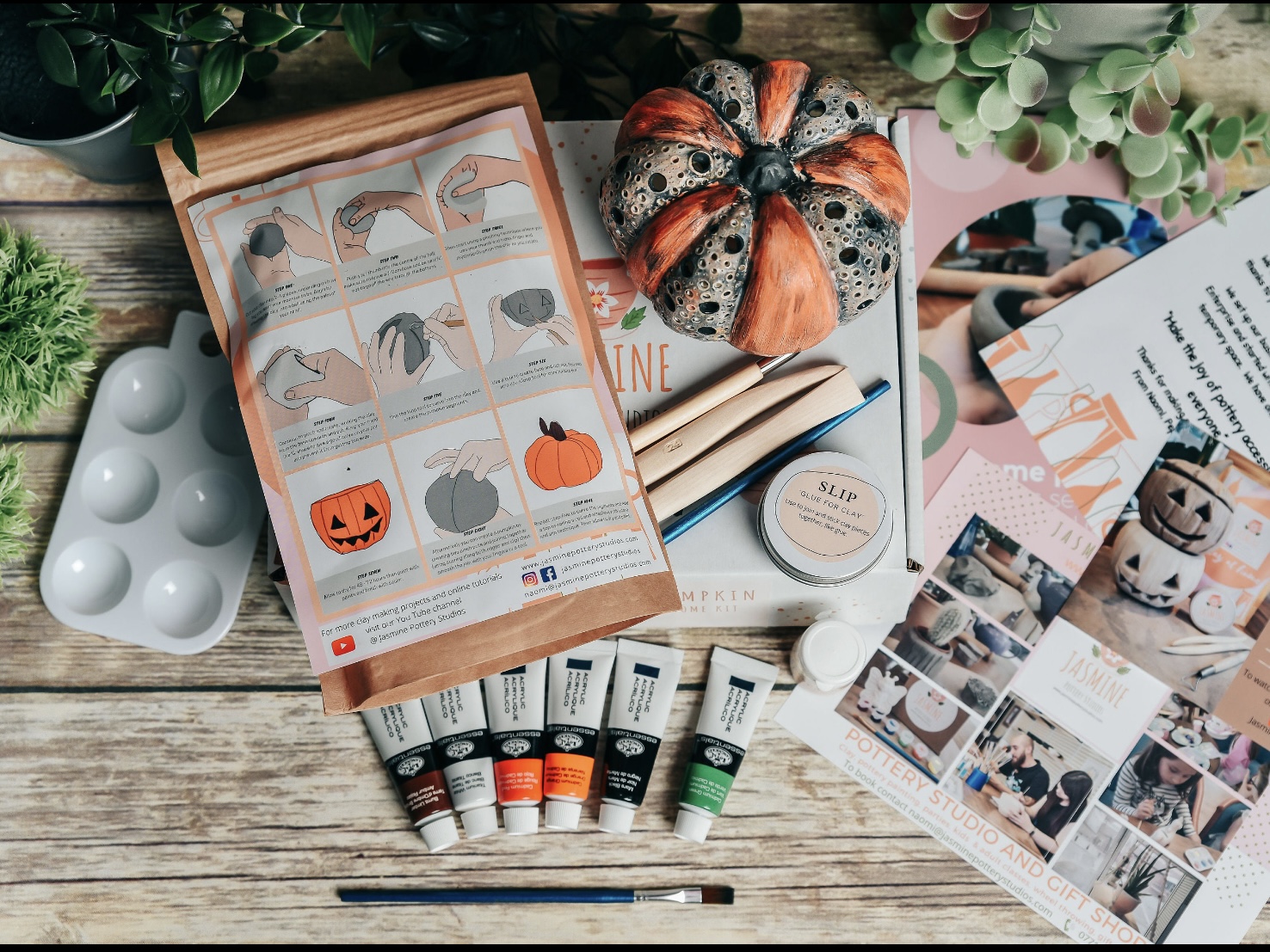 Ceramic pumpkin lantern kit with paints, tools and instructions