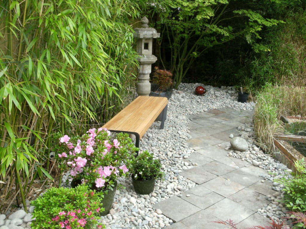 Japanese plants UK — bamboo, stone lantern and azaleas in a Japanese-style garden