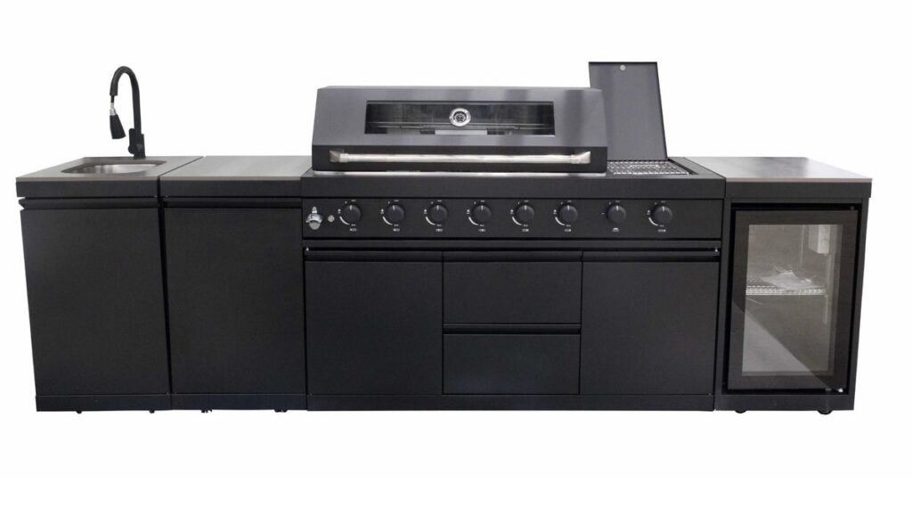Compact black outdoor kitchen with barbecue, sink, integrated fridge and sintered stone worktop