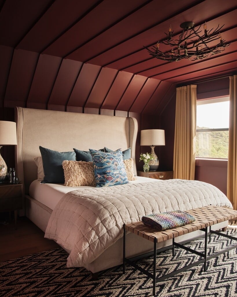 all-over burgundy bedroom with Farrow and Ball Preference Red walls and ceiling with branch chandelier