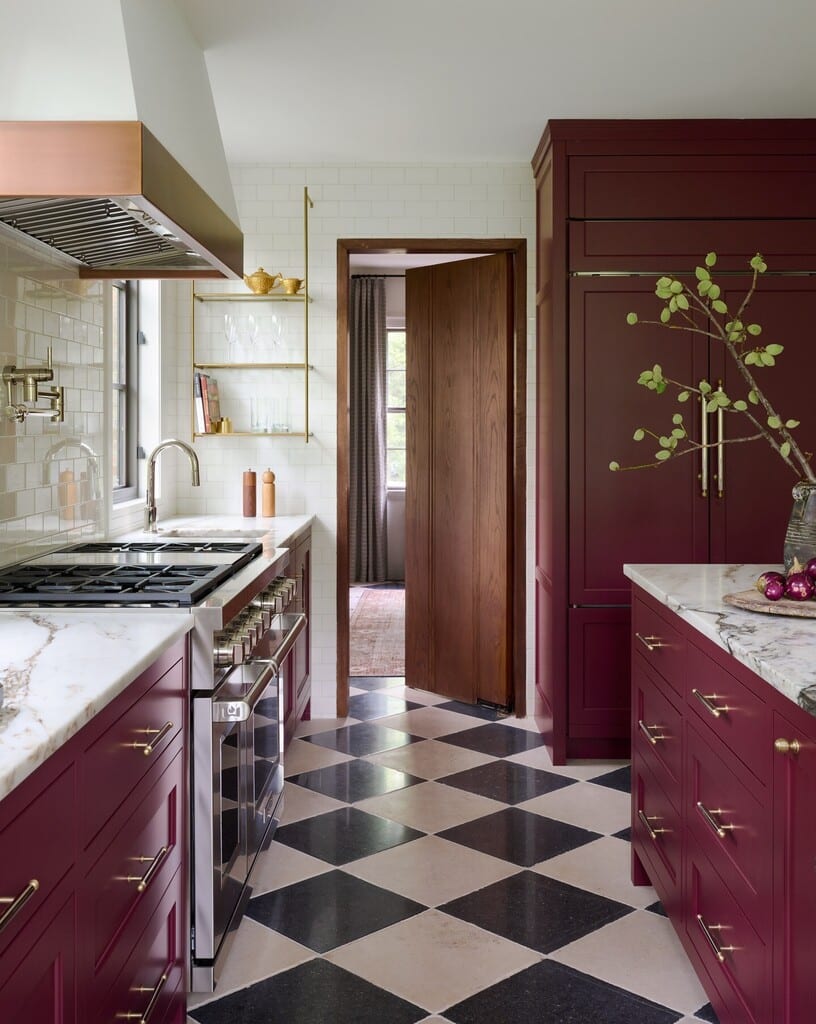 burgundy kitchen cabinets in Farrow and Ball Preference Red with brass hardware and chequerboard floor