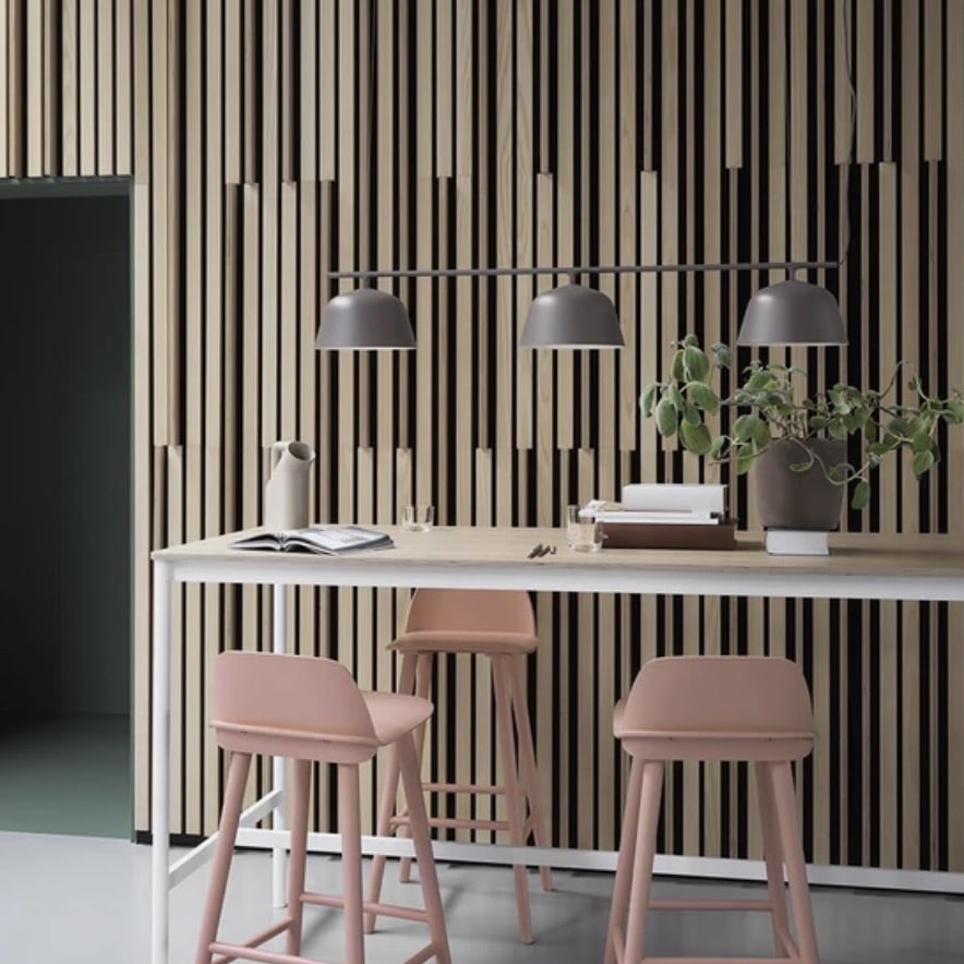 dining room lighting ideas with linear pendant light over rectangular dining table in a modern dining area