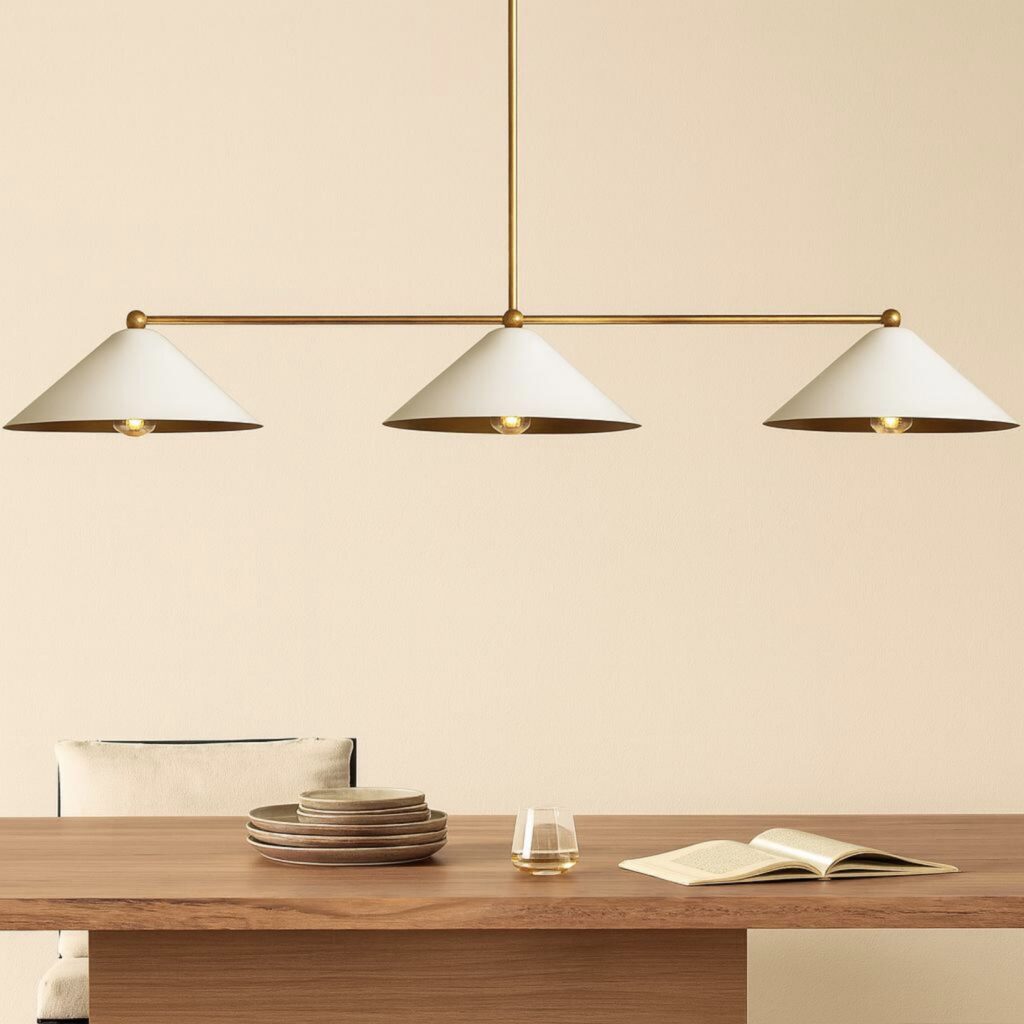 Mid century dining room lighting ideas with linear brass cone pendant lights over a dining table