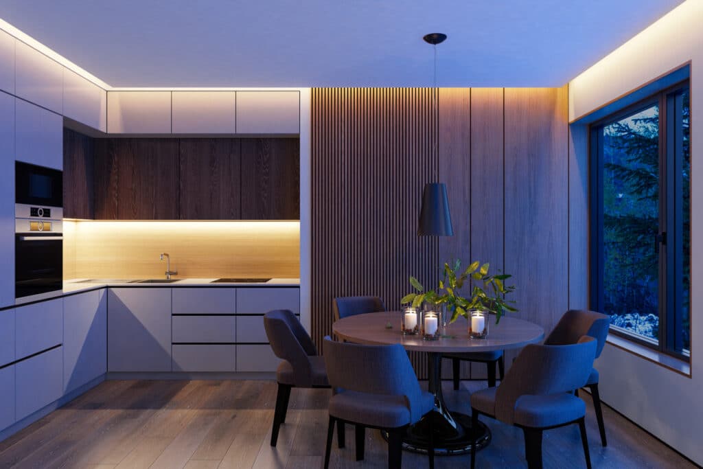 Dining room lighting ideas in a modern open-plan space with recessed ceiling lighting, pendant light and warm ambient glow around a round dining table