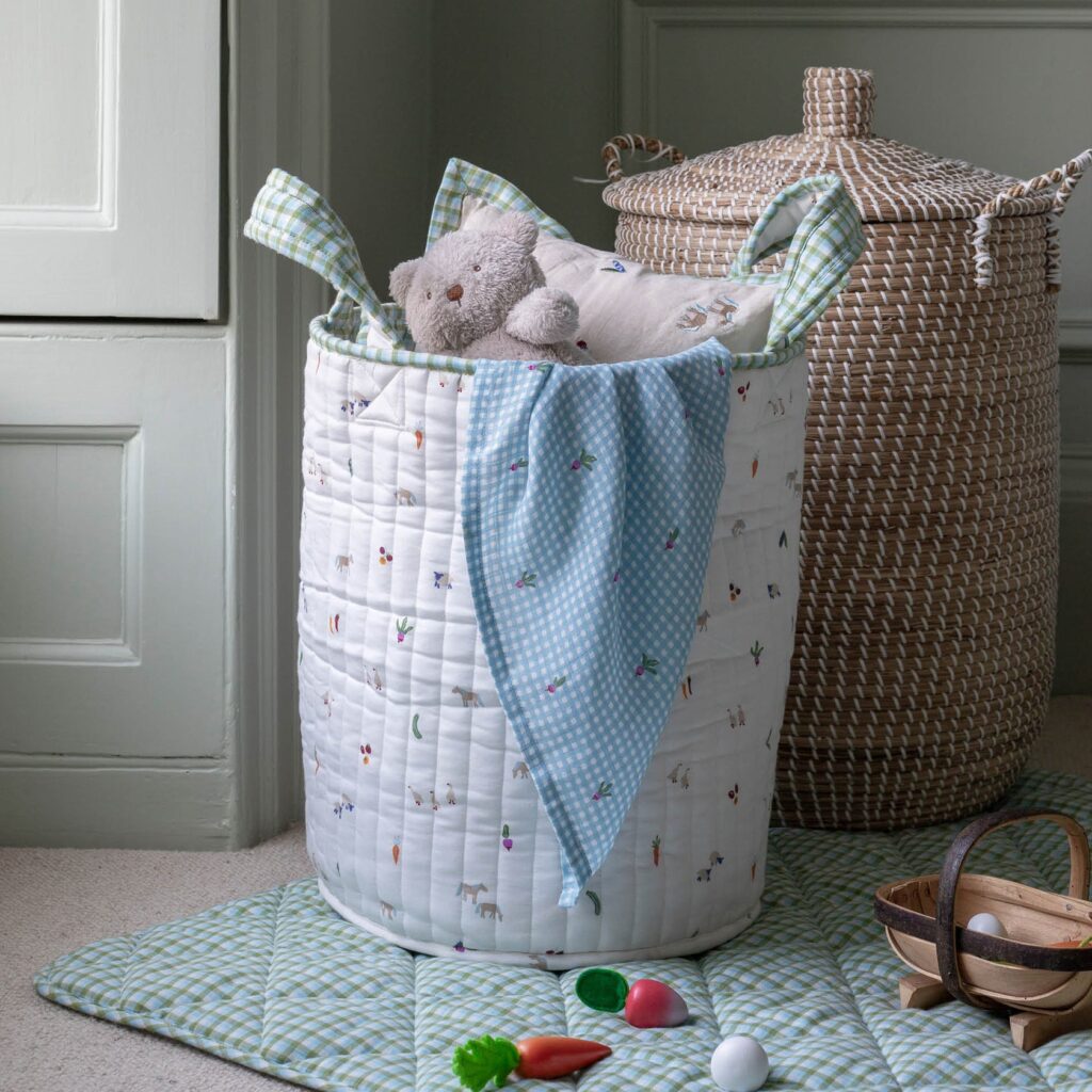 Nursery storage basket with farmyard print and gingham lining
