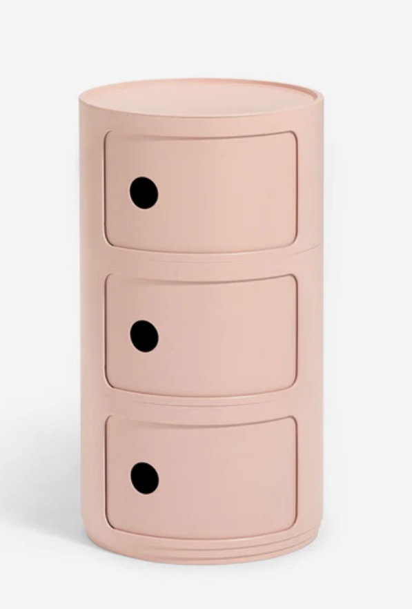 Pink Kartell Componibili bedside cabinet with three circular drawers—perfect for adding modern storage to a pink and green bedroom.