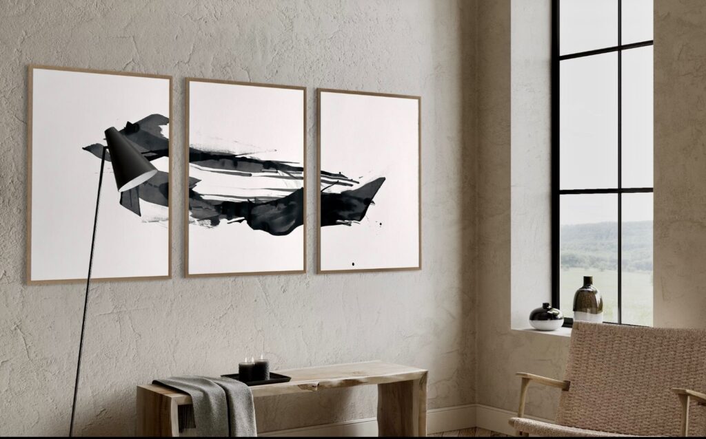 Wabi sabi interiors featuring minimalist ink triptych wall art in a Japandi-inspired living space