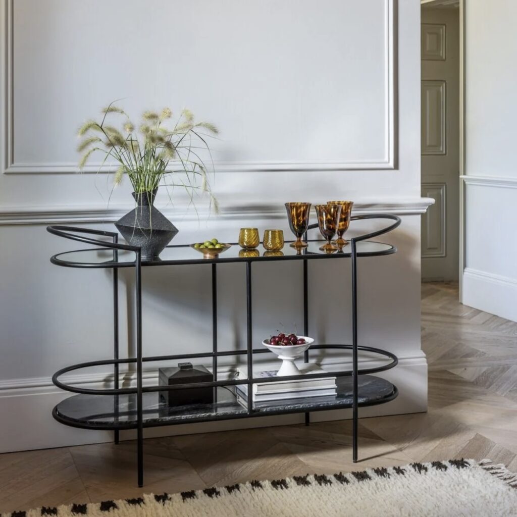 Contemporary black console table with glass and marble shelves