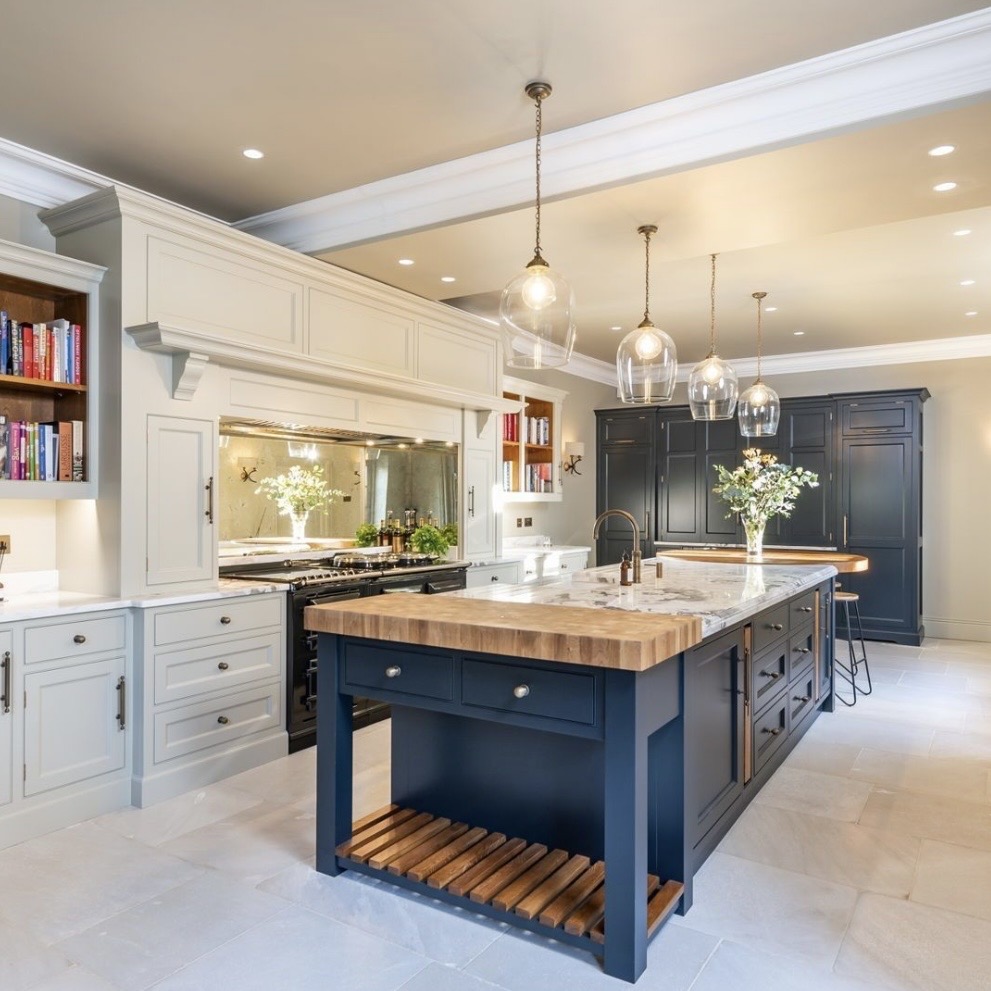 navy prep island in a kitchen with Old White cabinetry