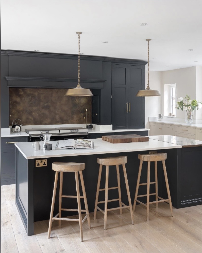 navy kitchen island in Farrow & Ball Railings with oak beam ceiling
