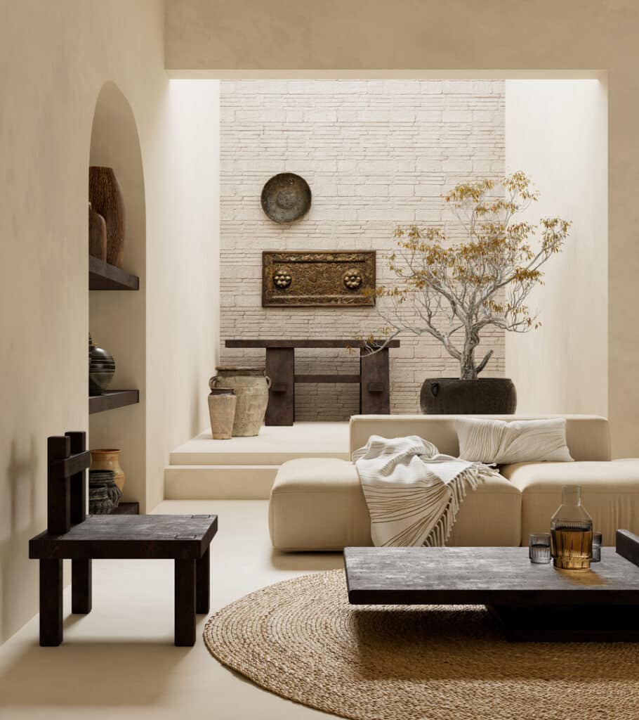 Wabi sabi interior design living room with textured plaster wall and sculptural tree