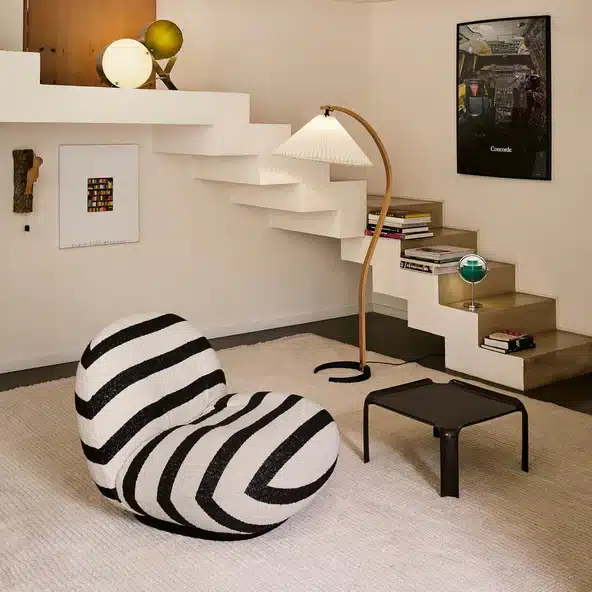 Home Black Patterned Accent Chair styling1 Black and cream striped GUBI Pacha lounge chair styled in a contemporary living room