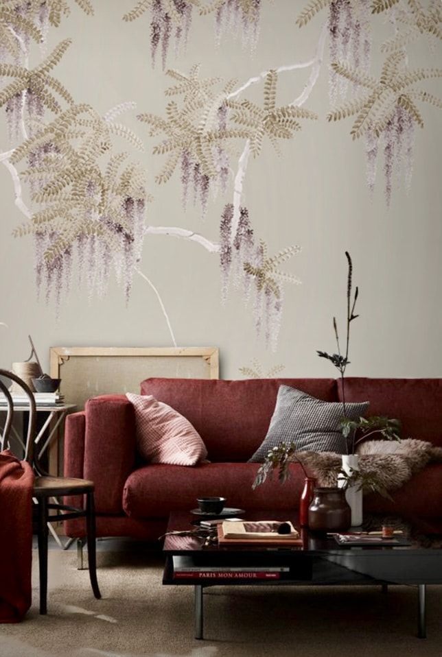Lilac and gold chinoiserie wallpaper with bright coloured sofa by DAVIDQIANART
