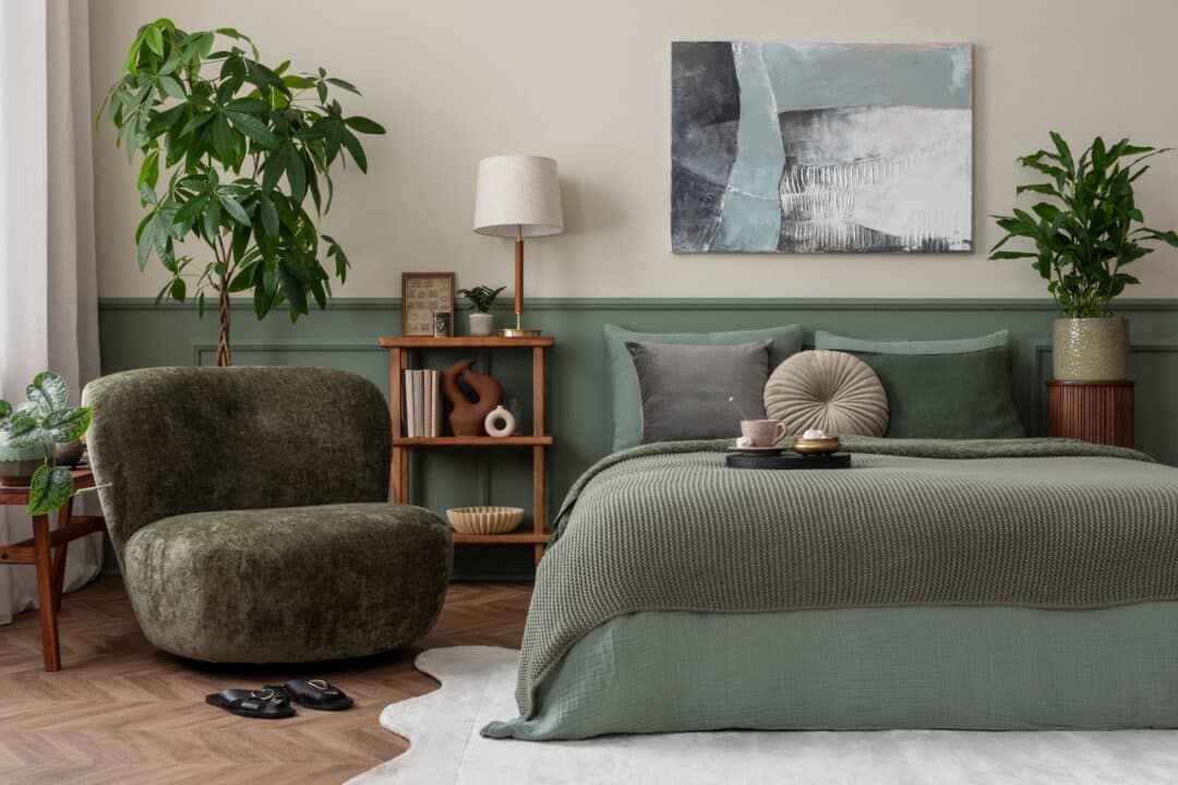 Green and beige bedroom ideas with layered bedding, soft textiles and calming natural tones