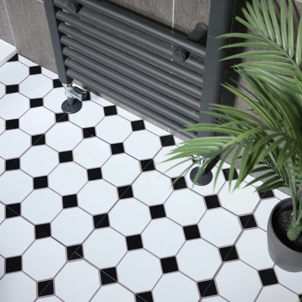 Black and white bathroom floor with octagon pattern vinyl flooring