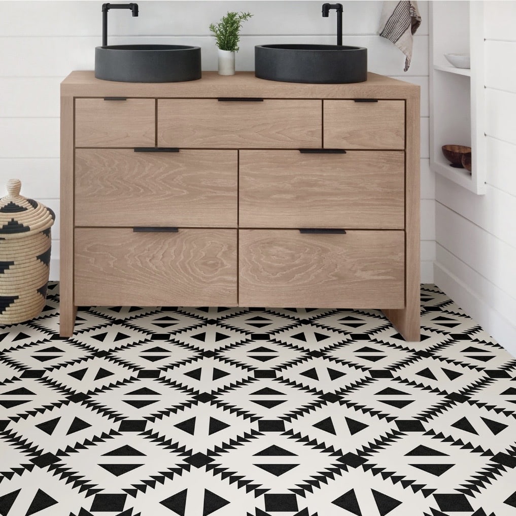 Black and white bathroom floor with geometric triangle vinyl flooring