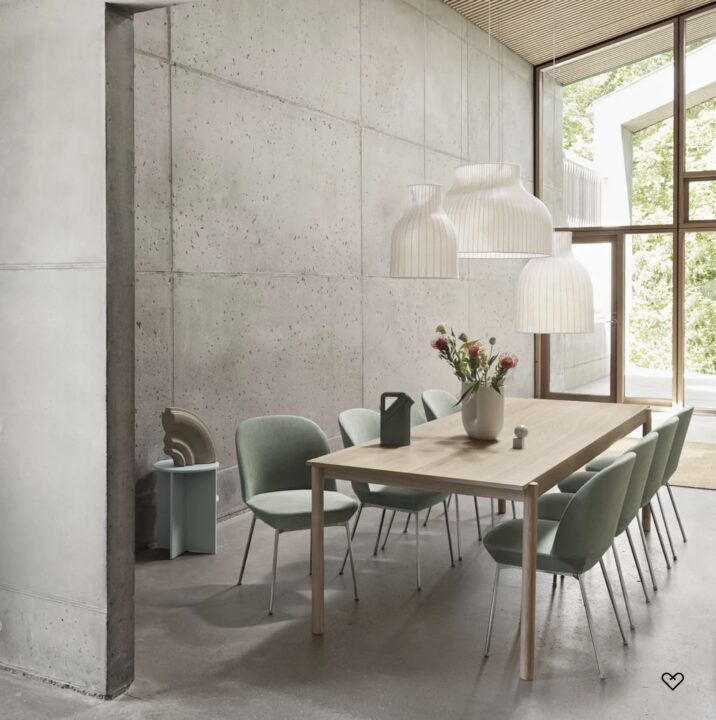 3 Dining room pendant lights above the light oak dining table with light green dining chairs