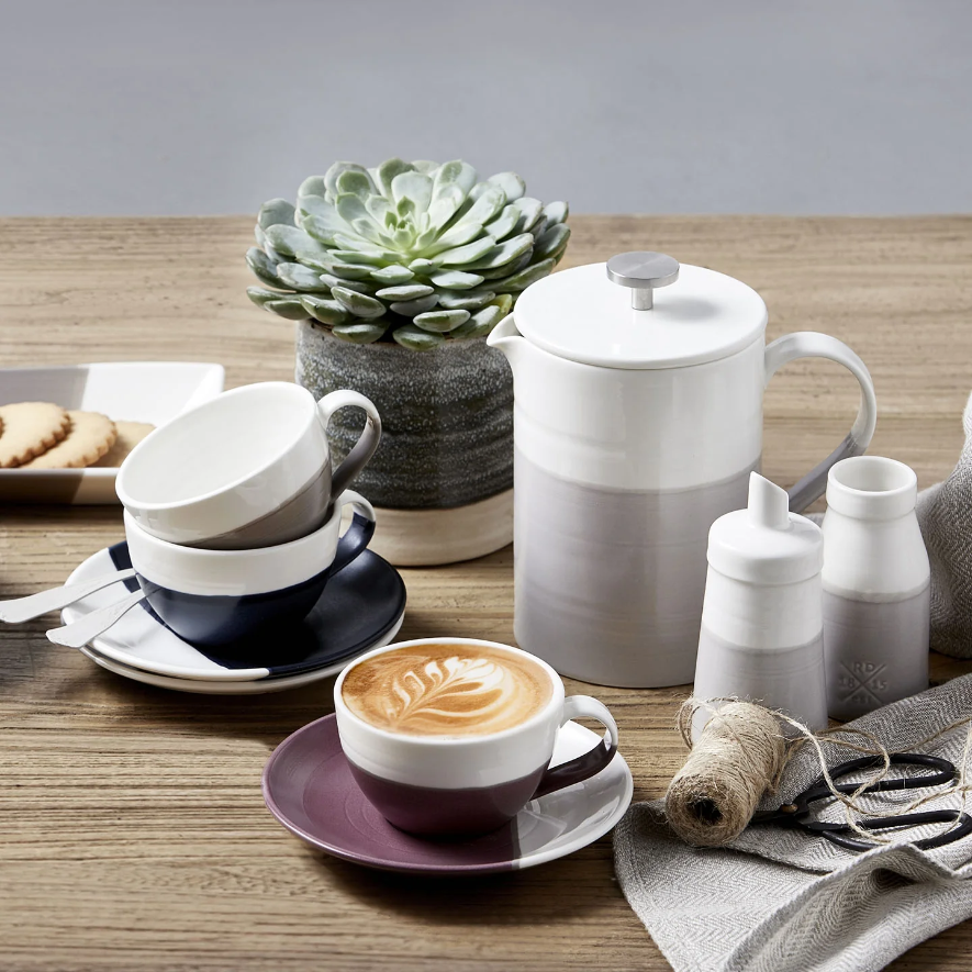Royal Doulton Coffee Studio cappuccino cup and saucer set styled with a coffee press and latte art
