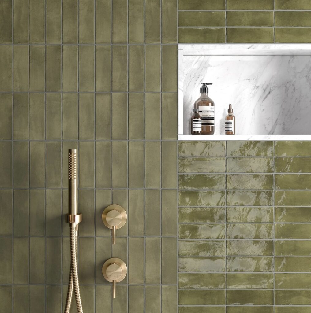 Shower with Atlas Green Matt Moroccan wall tiles, marble niche and brass fittings – green bathroom ideas