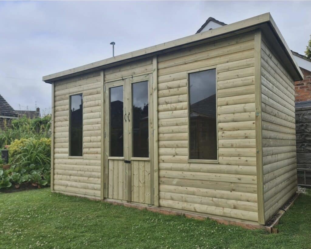 Bakewell pent roof summerhouse with glazed doors and timber cladding