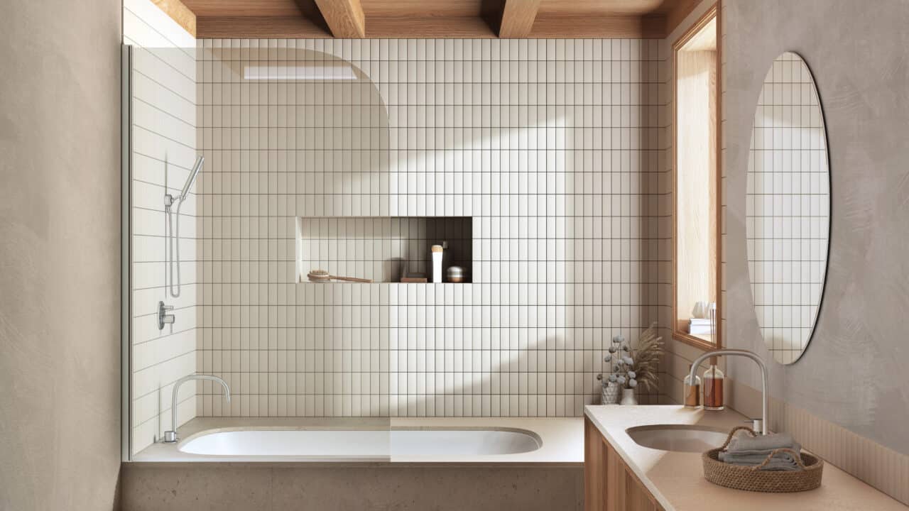 Japandi bathroom with white square tiles, a minimalist bathtub, wooden vanity, and neutral tones.