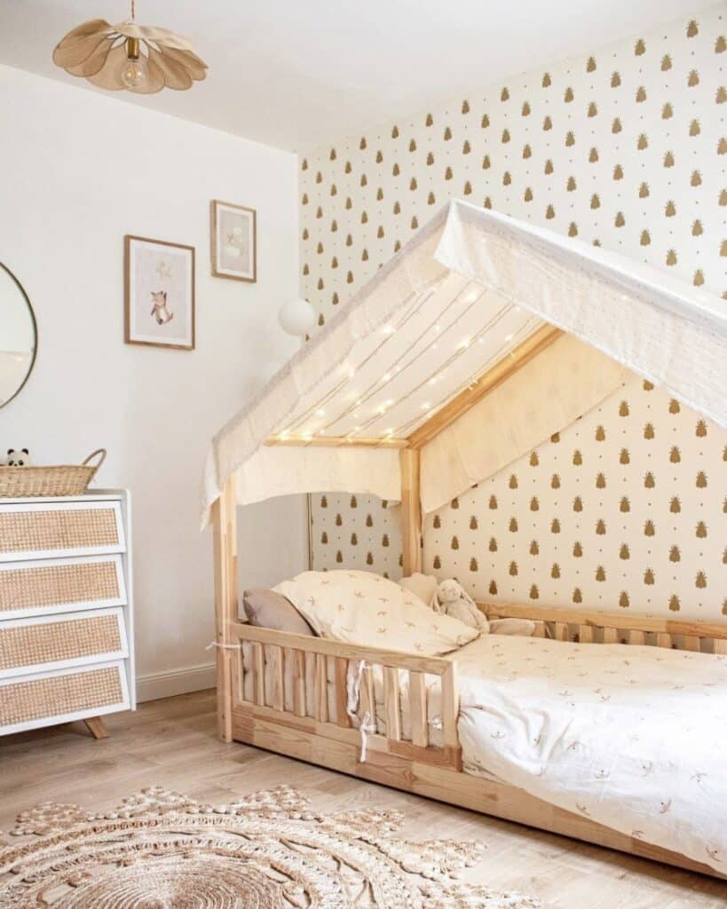 Girls bedroom with Farrow and Ball Bumble Bee wallpaper, wooden house bed and rattan chest of drawers — girls bedroom wallpaper ideas