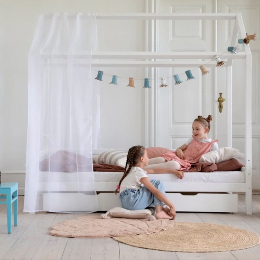 Hoppekids Eco Dream House Bed in white with canopy curtain and under-bed drawer storage — girls bedroom ideas