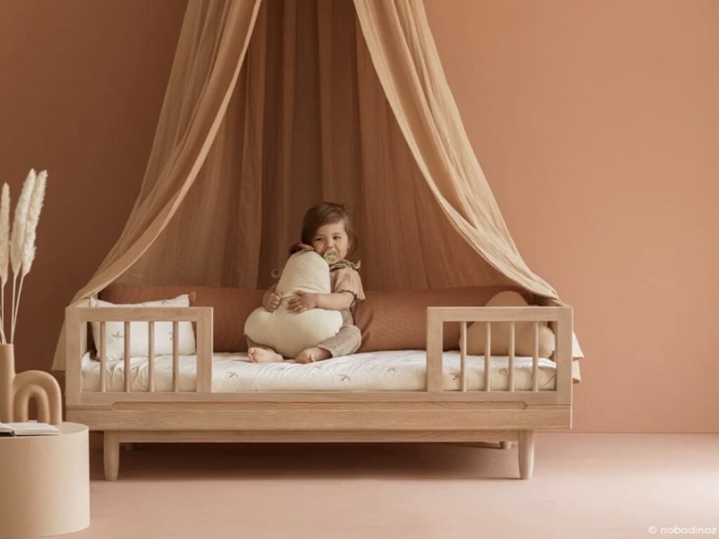 Nobodinoz Pure Junior Bed in oak with canopy and terracotta walls — little girls bedroom ideas