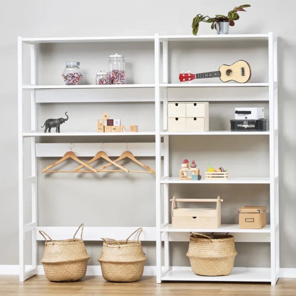 Hoppekids Storey shelving unit in white with books, toys and storage baskets — girls bedroom storage ideas