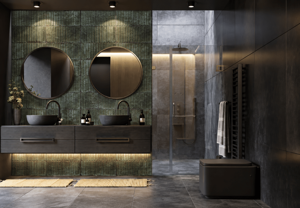 Fluted green tile accent wall with matte black double vanity and round mirrors