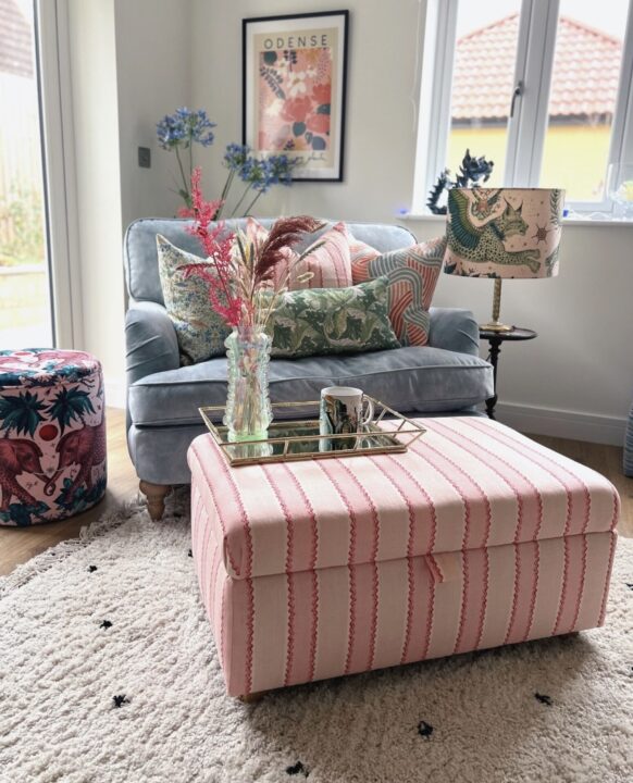 Pink and beige striped colourful coffee table in pink grey and beige living room