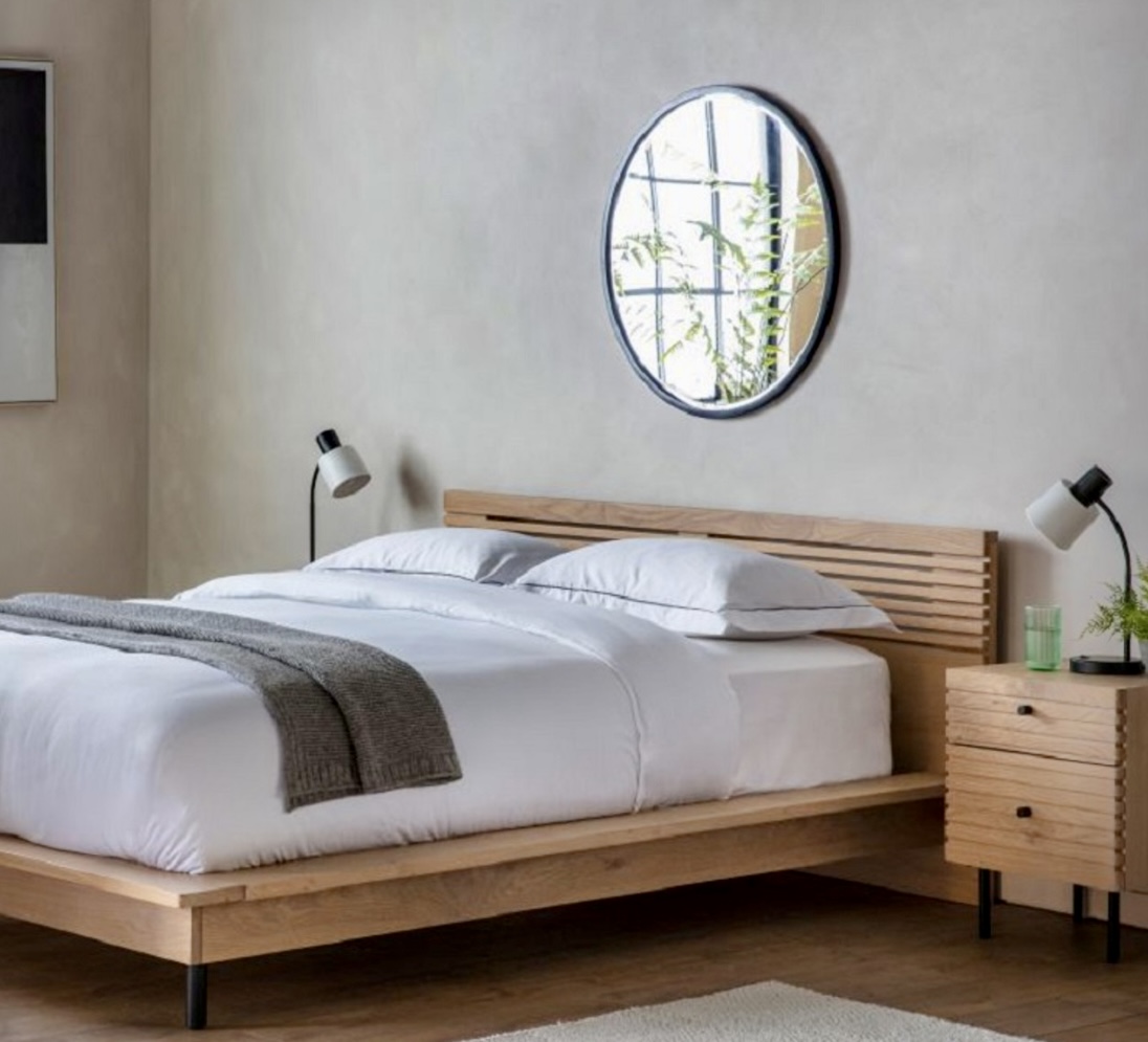 Kyoto Japanese oak bed in a Japandi style bedroom with slatted headboard, minimalist oak nightstand, and soft neutral tones for a calm, contemporary look.