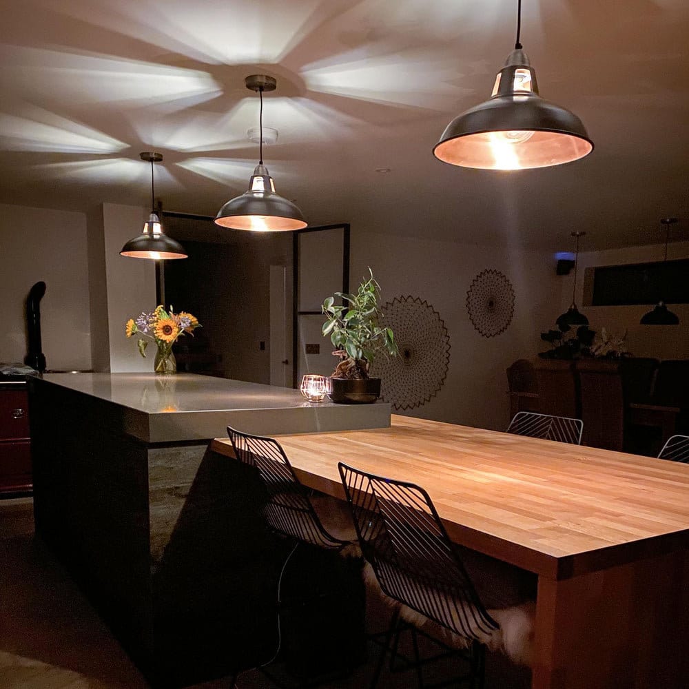Pewter and copper pendant lights above a kitchen island, kitchen pendant lighting from Industville.