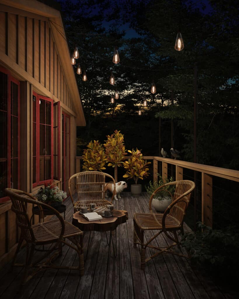Small balcony lighting for ambience with warm festoon drop lights above a cosy rattan seating area on a wooden deck.