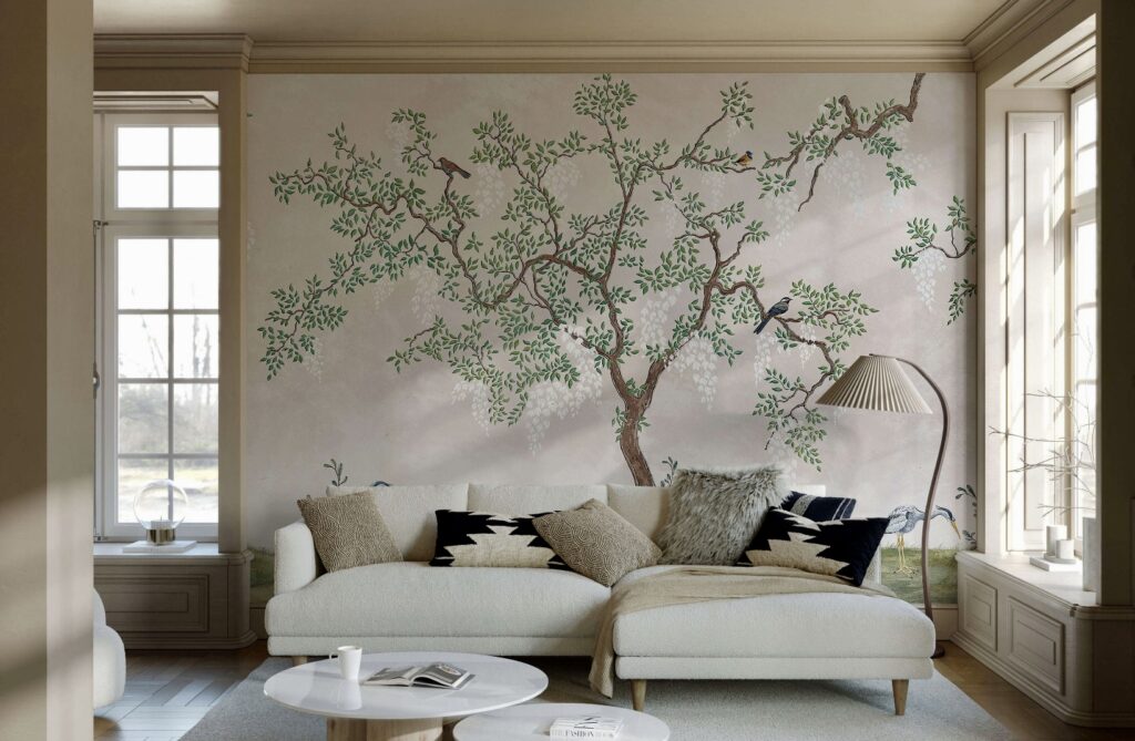 Feature wall ideas: A serene beige chinoiserie mural with delicate tree branches and birds, adding timeless elegance to a living room. The soft, hand-painted effect pairs beautifully with neutral furnishings and natural light, creating a sophisticated and calming space.