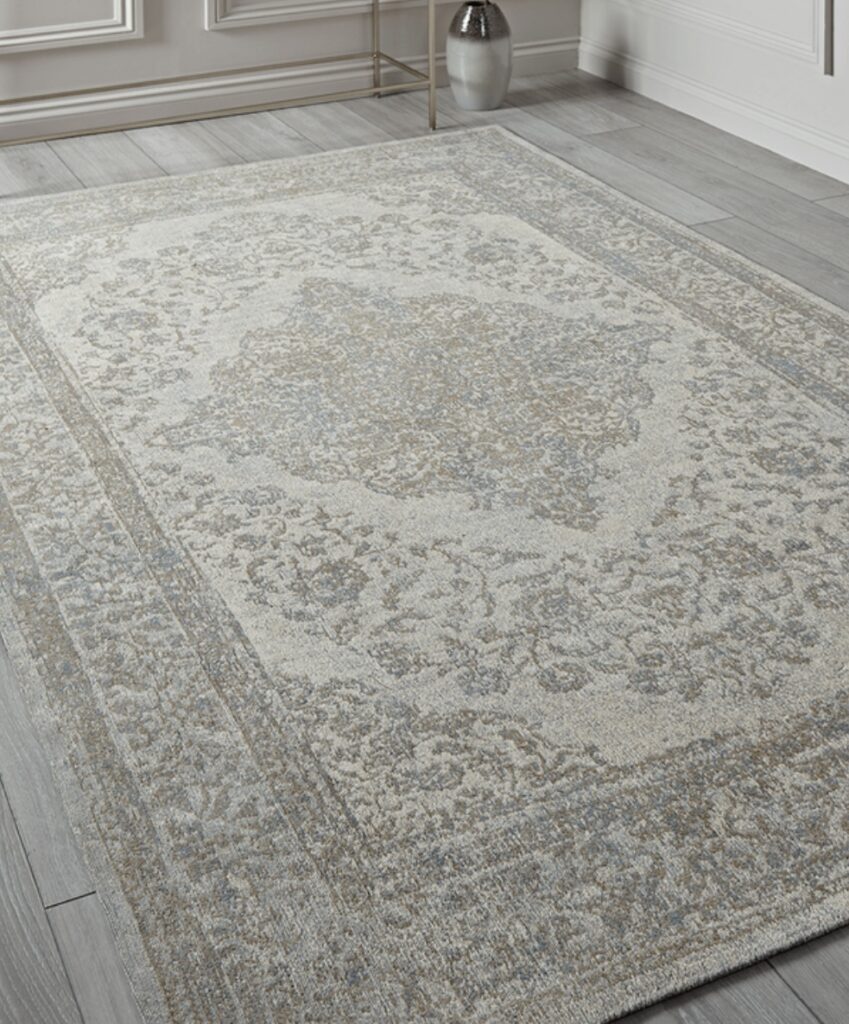 Desi rug in soft neutrals styled in a blue bedroom – blue bedroom ideas