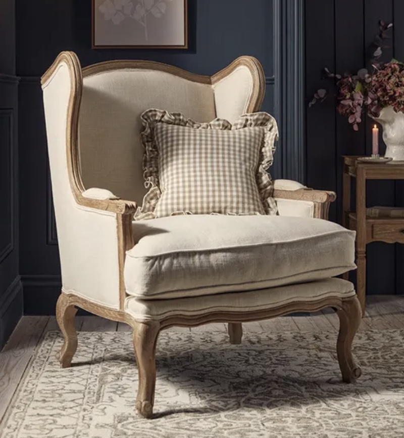 Elegant Hamina armchair in a classic blue bedroom with neutral tones – blue bedroom ideas