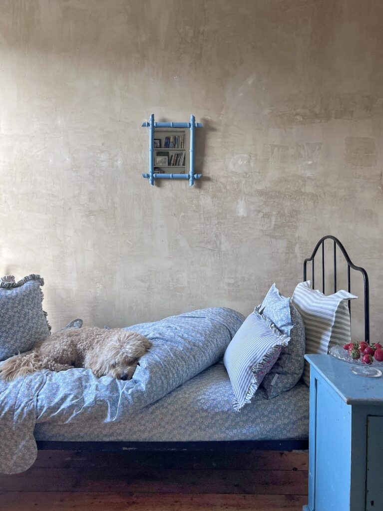 Cosy blue bedroom with Liberty ‘Paysanne Blossom’ pillowcase by Poppy & Honesty.