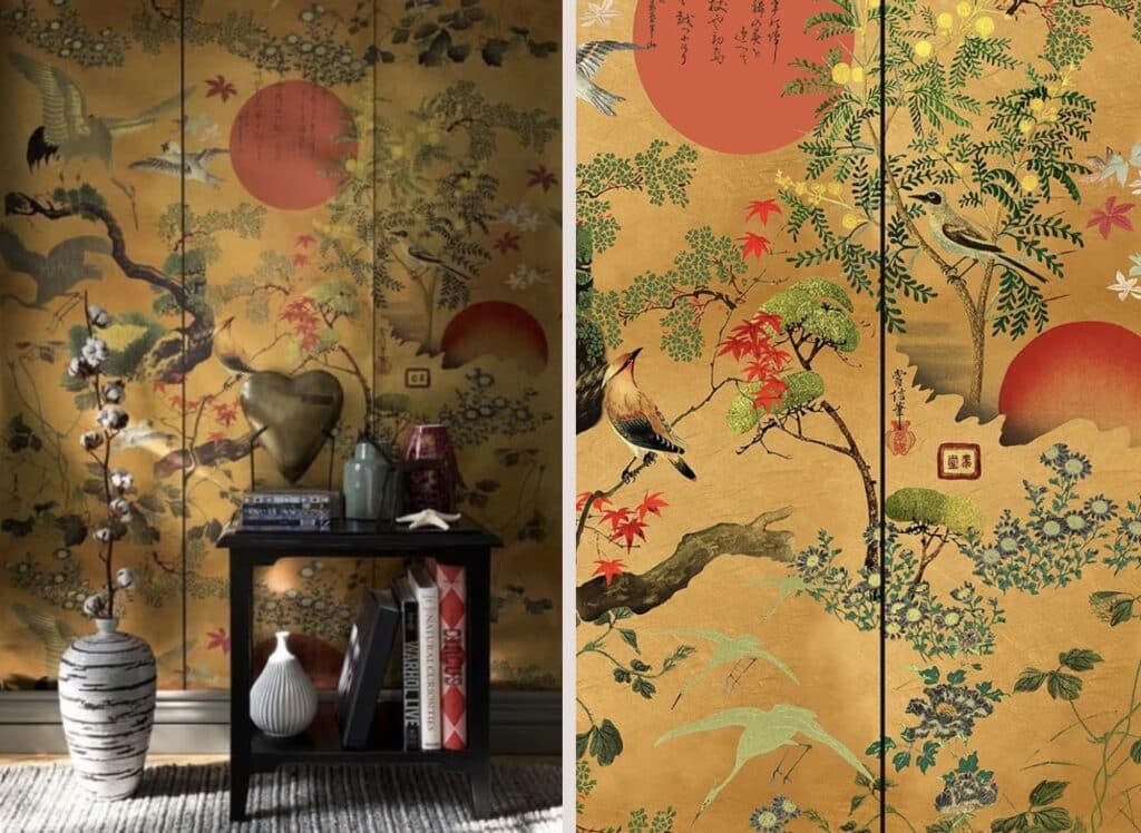 Mind the Gap Byobu mustard colour wallpaper with birds and red sun, styled behind a black side table and ceramic vase.