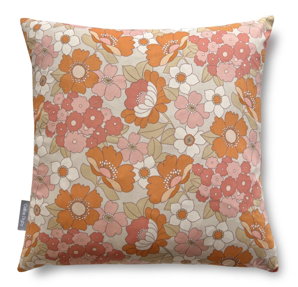 Retro floral orange cushion with pink and cream – bold orange home accessory