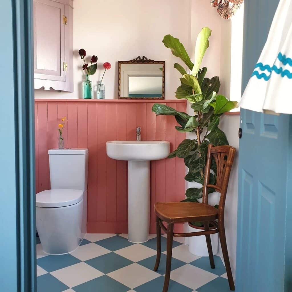 Small bathroom with Fruit Fool tongue and groove panelling below dado rail, Great White walls, blue and white checkerboard vinyl floor and fiddle leaf fig — budget small bathroom ideas UK