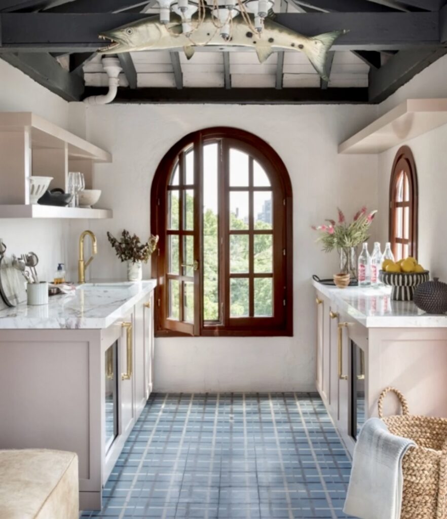 Small kitchen ideas with Farrow & Ball Dead Salmon cabinets and arched wooden windows