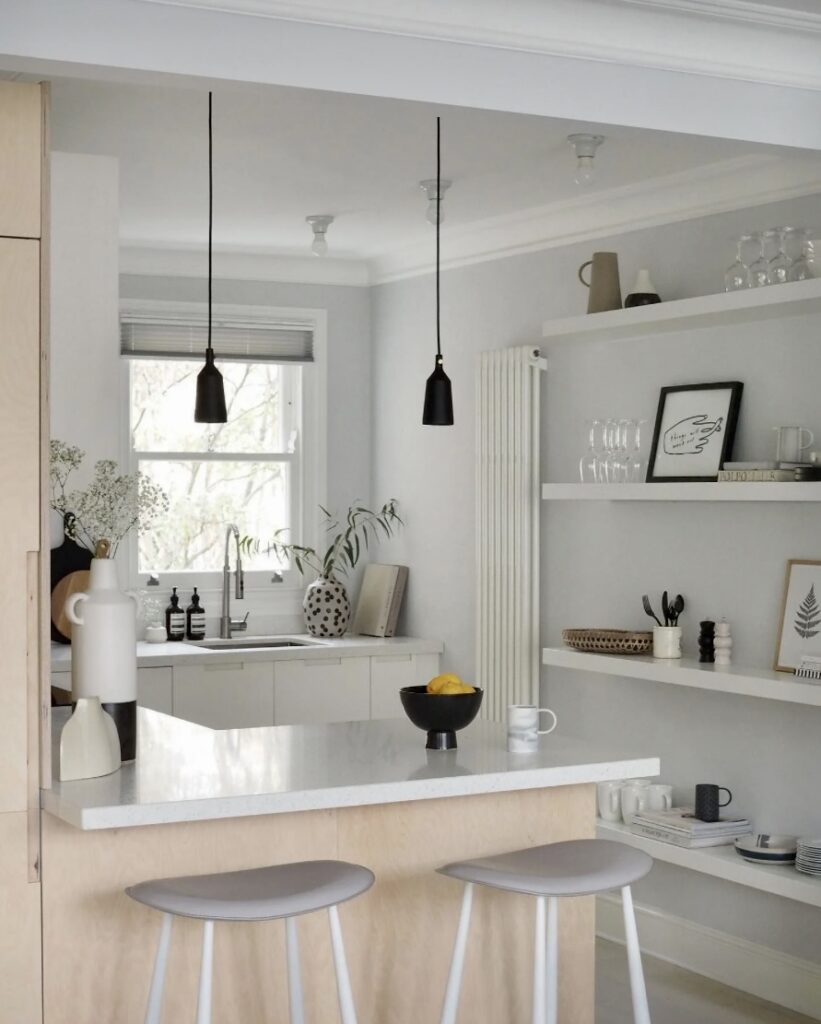 Small kitchen ideas using Farrow & Ball Blackened with pale wood and black accents