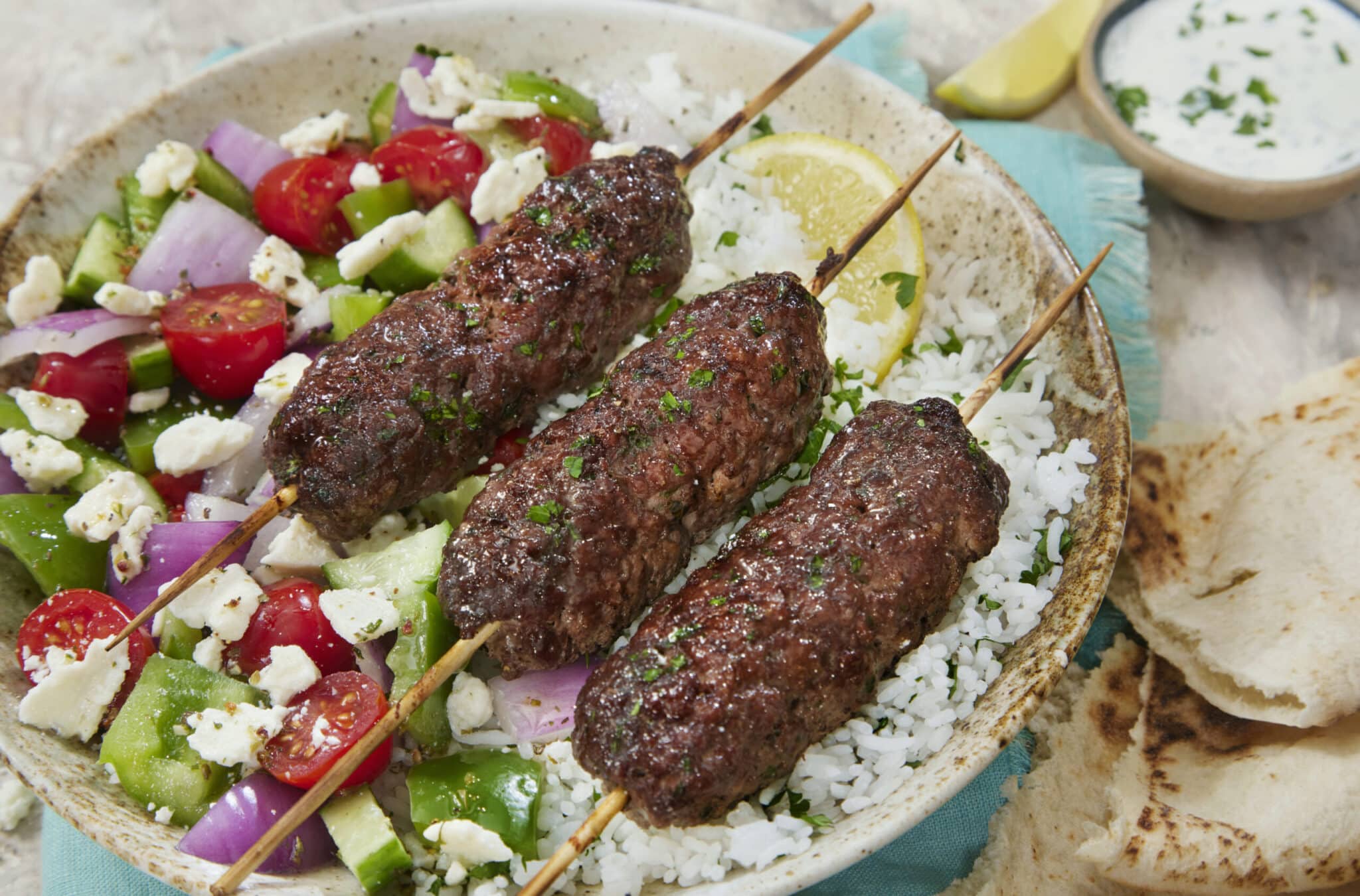 Mini beef kofta with Greek salad and mint kefir dip
