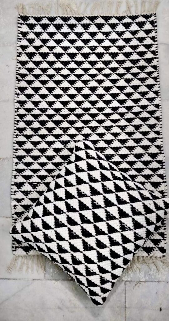 Black and white Chindi rag rug with matching cushion