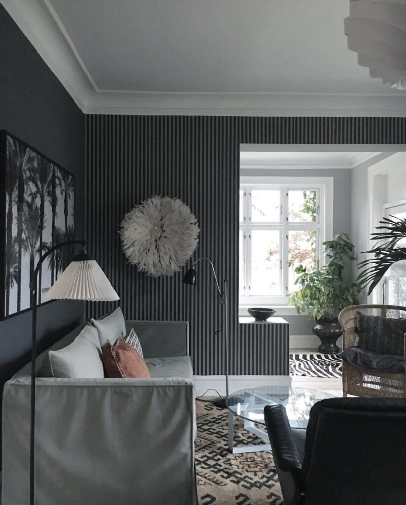 Small living room ideas with Down Pipe walls, striped wallpaper, and Pavilion Gray accents for a bold yet elegant look.