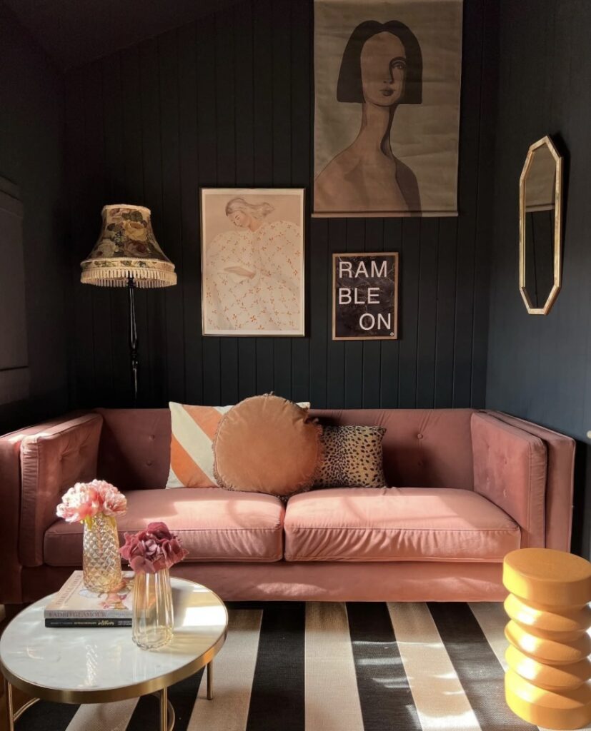 Small living room ideas with Railings painted walls, pink velvet sofa, and striped rug for bold cosy living room décor.