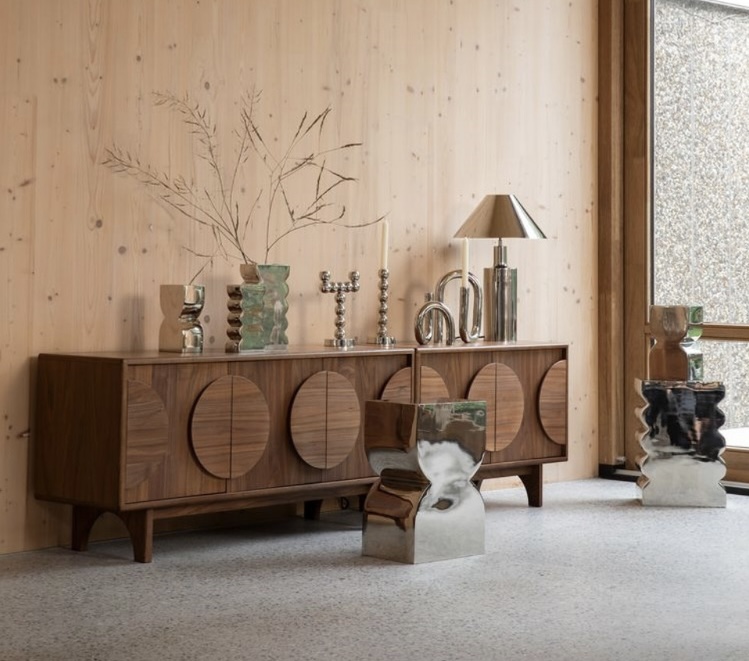 Retro sideboard with geometric circular doors and metallic decorative accents
